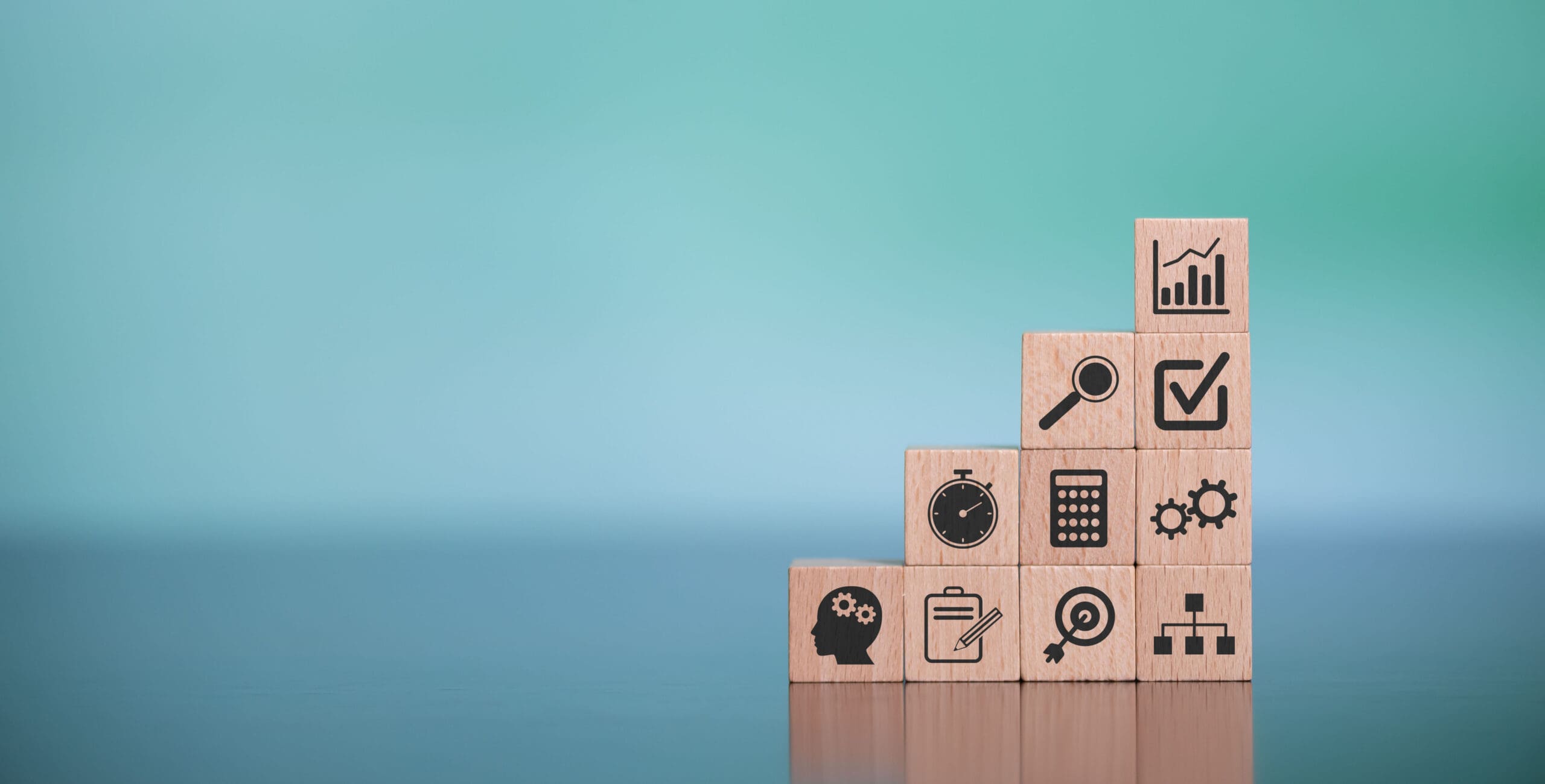 Wooden blocks with project management icons